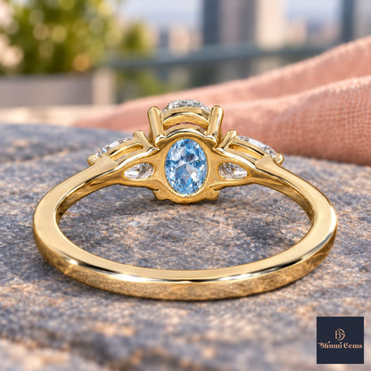 Blue Oval Cut Lab Grown Diamond Engagement Ring - Pear Side Stones in yellow gold, gallery view