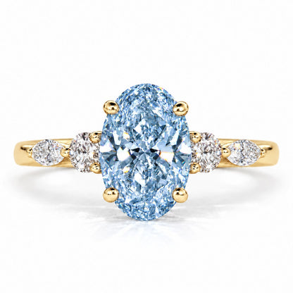 Blue Oval Cut Lab Grown Diamond Engagement Ring - Round and Marquise Accents in yellow gold, front view