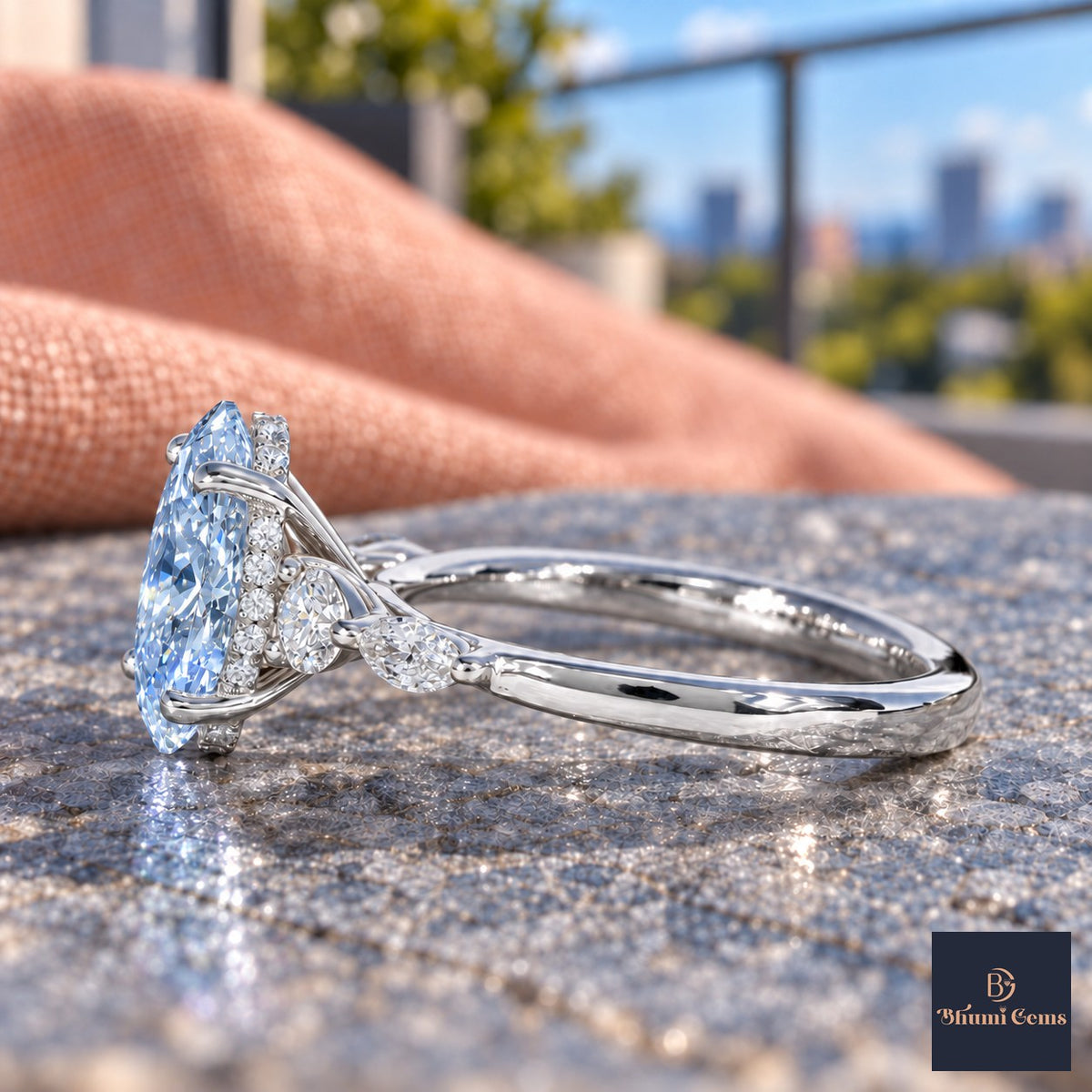 Blue Oval Cut Lab Grown Diamond Engagement Ring - Round and Marquise Accents in white gold, side view