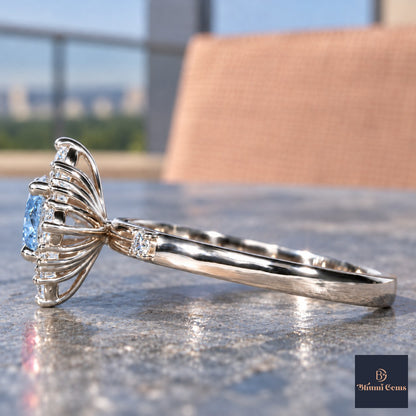 Blue Oval Cut Lab Grown Diamond Engagement Ring - Scalloped Halo in white gold, side view