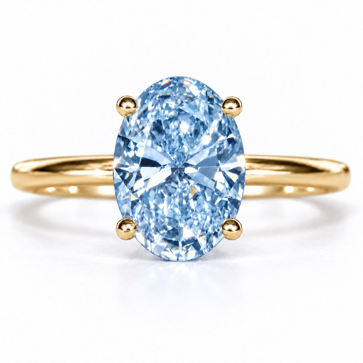 Blue Oval Cut Lab Grown Diamond Engagement Ring - Six Prong Solitaire in yellow gold, front view