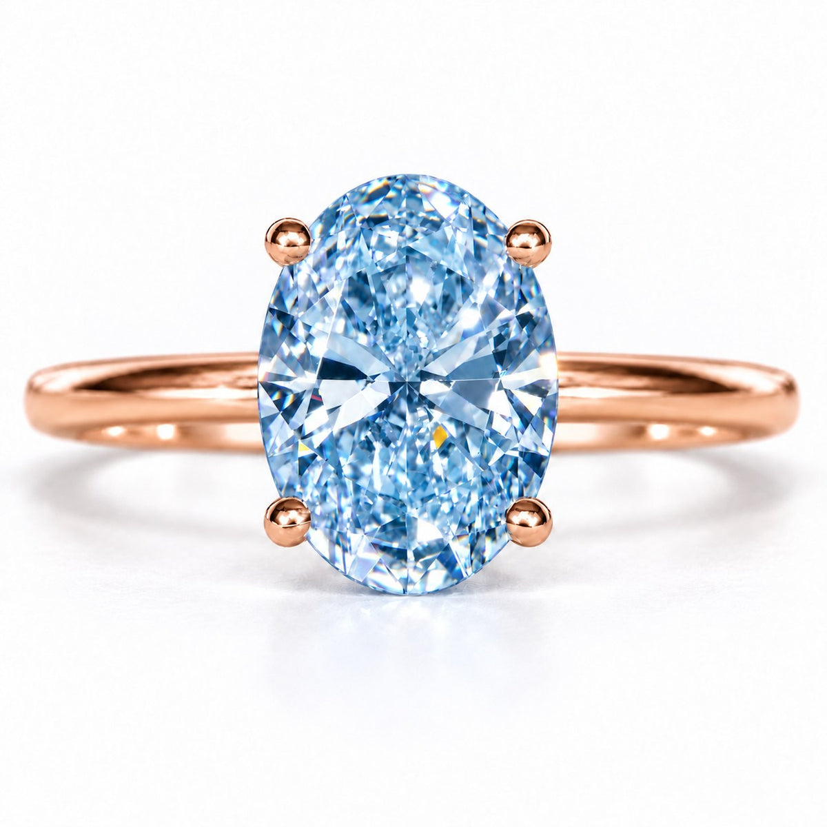 Blue Oval Cut Lab Grown Diamond Engagement Ring - Six Prong Solitaire in rose gold, front view