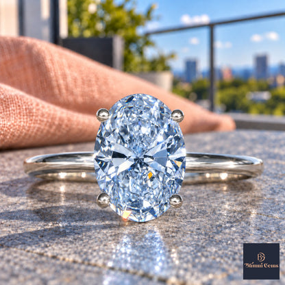 Blue Oval Cut Lab Grown Diamond Engagement Ring - Six Prong Solitaire in white gold, close-up