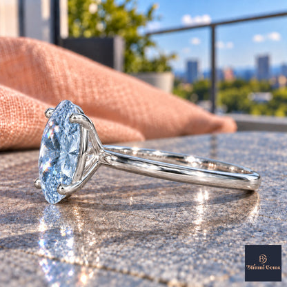 Blue Oval Cut Lab Grown Diamond Engagement Ring - Six Prong Solitaire in white gold, side view