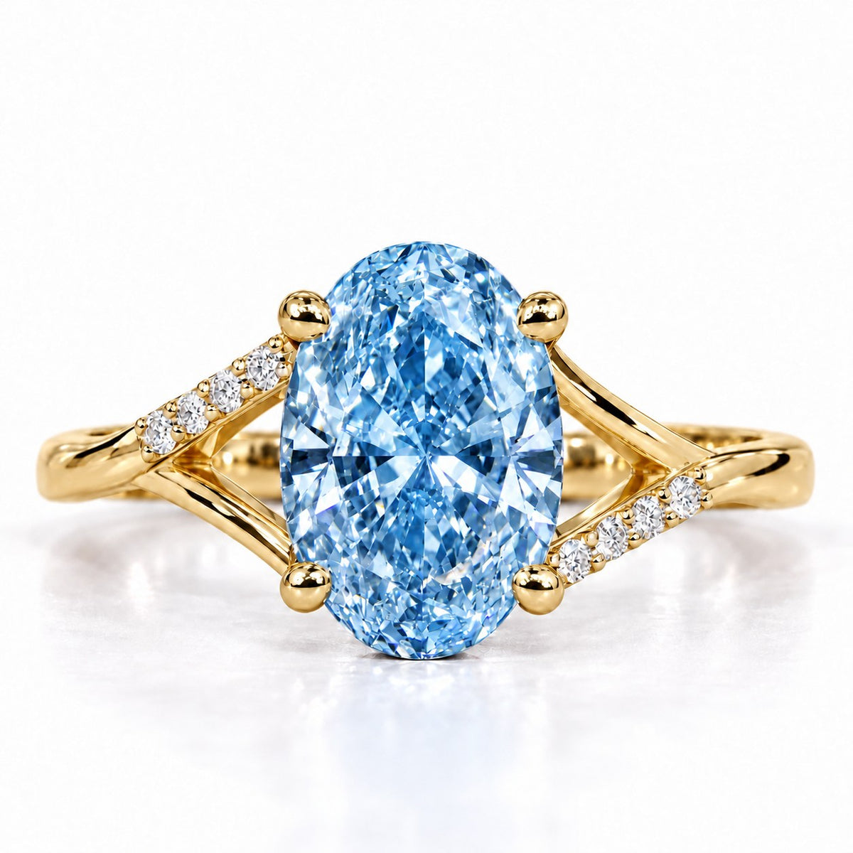 Blue Oval Cut Lab Grown Diamond Engagement Ring - Split Pave Shoulders in yellow gold, front view