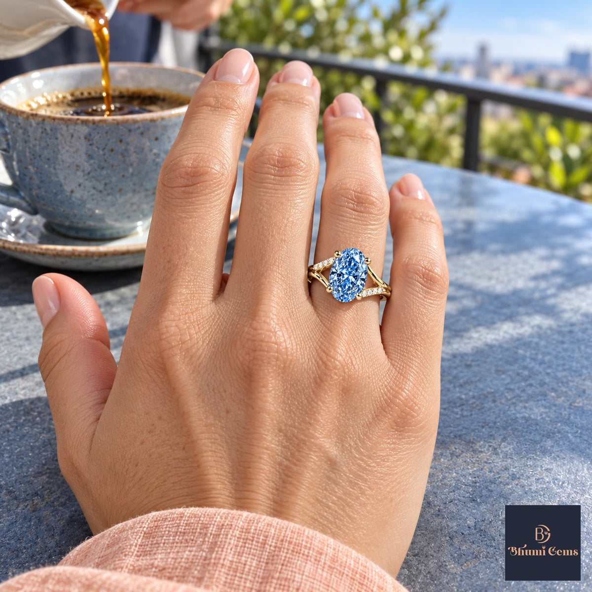 Blue Oval Cut Lab Grown Diamond Engagement Ring - Split Pave Shoulders in yellow gold, on the hand