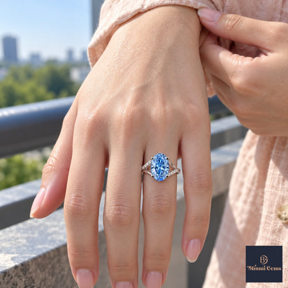 Blue Oval Cut Lab Grown Diamond Engagement Ring - Split Pave Shoulders in white gold, worn on the hand