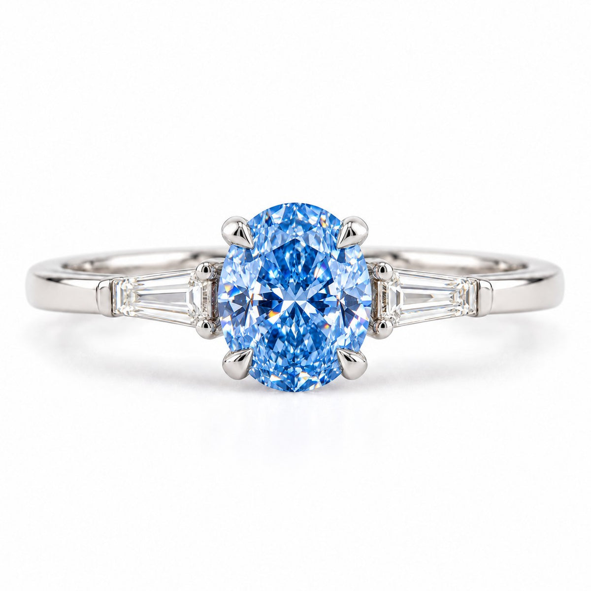 Blue Oval Cut Lab Grown Diamond Engagement Ring - Tapered Baguettes in white gold, front view
