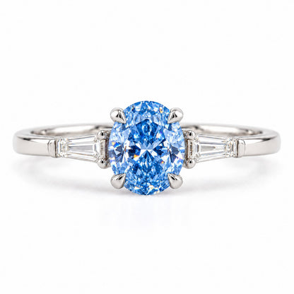 Blue Oval Cut Lab Grown Diamond Engagement Ring - Tapered Baguettes in white gold, front view