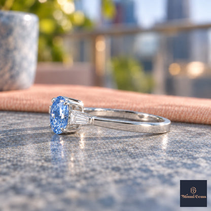 Blue Oval Cut Lab Grown Diamond Engagement Ring - Tapered Baguettes in white gold, side view