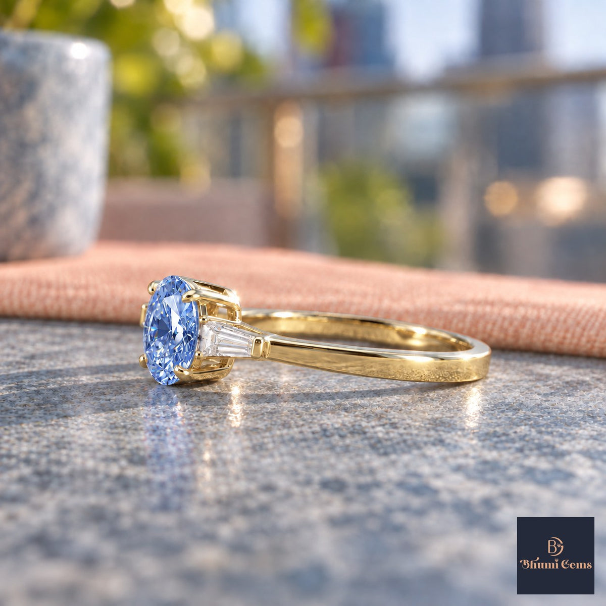 Blue Oval Cut Lab Grown Diamond Engagement Ring - Tapered Baguettes in yellow gold, side view