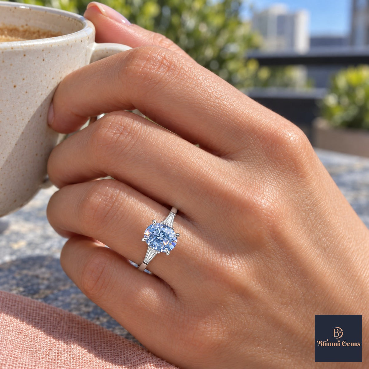 Blue Oval Cut Lab Grown Diamond Engagement Ring - Tapered Baguettes in white gold, on the hand
