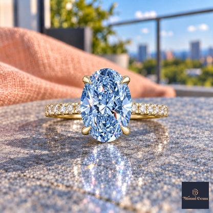 Blue Oval Cut Lab Grown Diamond Engagement Ring - Thin Pave Band in yellow gold, close-up