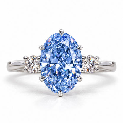 Blue Oval Cut Lab Grown Diamond Engagement Ring - Three Stone in white gold, front view