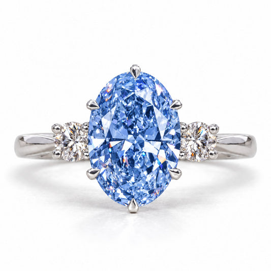 Blue Oval Cut Lab Grown Diamond Engagement Ring - Three Stone in white gold, front view