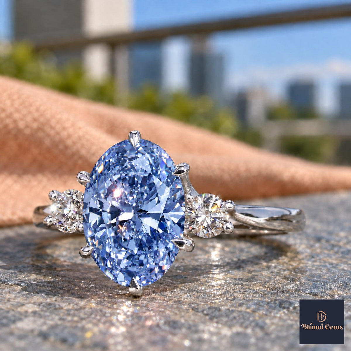 Blue Oval Cut Lab Grown Diamond Engagement Ring - Three Stone in white gold, close-up