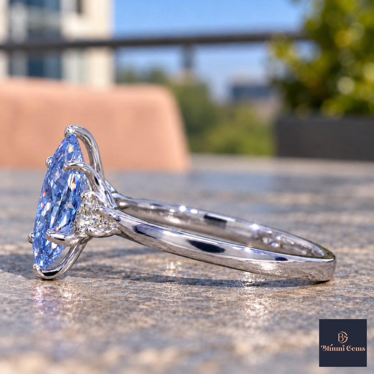 Blue Oval Cut Lab Grown Diamond Engagement Ring - Three Stone in white gold, side view
