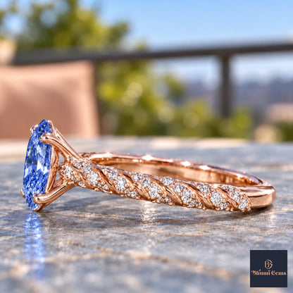 Blue Oval Cut Lab Grown Diamond Engagement Ring - Twisted Rope Band in rose gold, side view