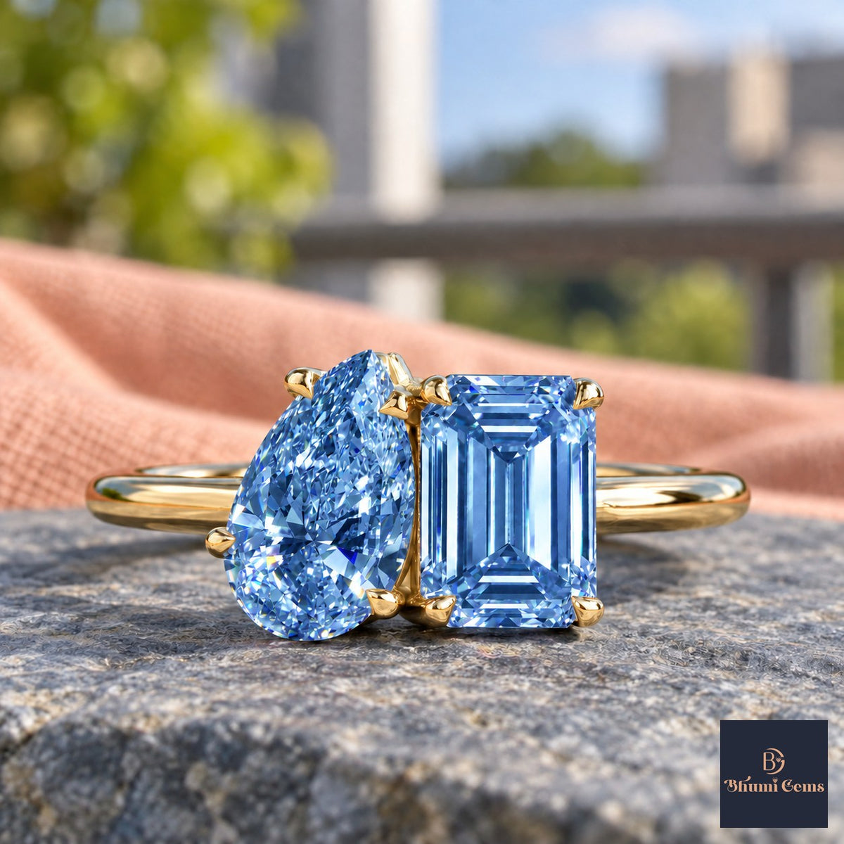 Blue Pear and Emerald Cut Lab Grown Diamond Engagement Ring - Toi et Moi in yellow gold, close-up