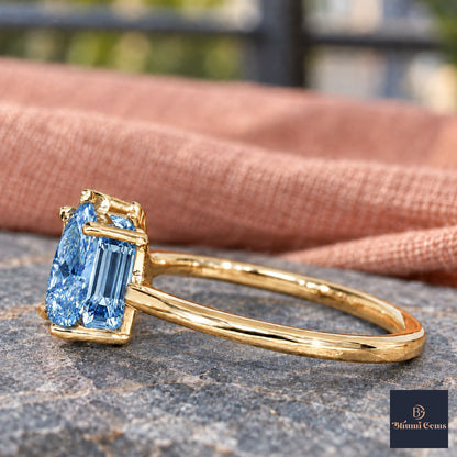 Blue Pear and Emerald Cut Lab Grown Diamond Engagement Ring - Toi et Moi in yellow gold, side view
