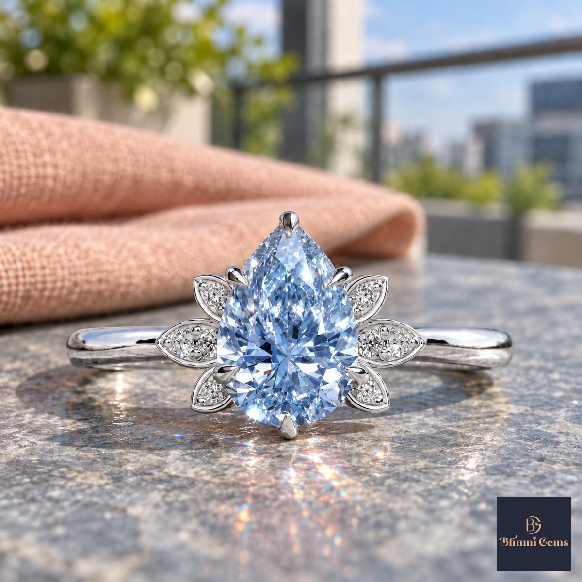 Blue Pear Cut Lab Grown Diamond Engagement Ring - Floral Leaf Accents in white gold, close-up