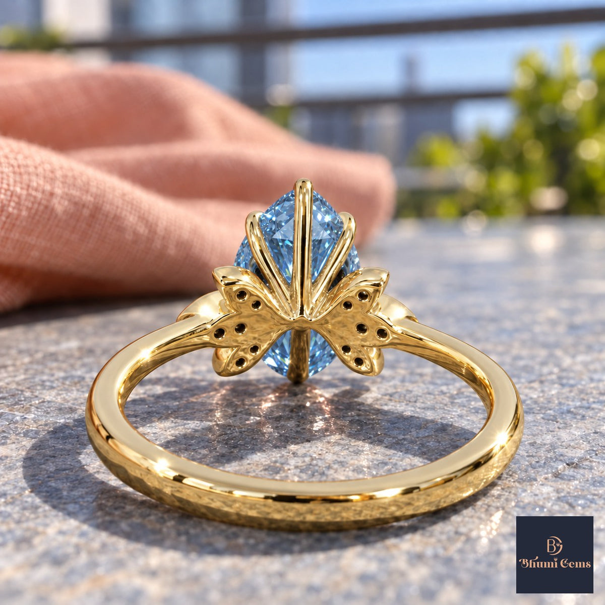 Blue Pear Cut Lab Grown Diamond Engagement Ring - Floral Leaf Accents in yellow gold, gallery view