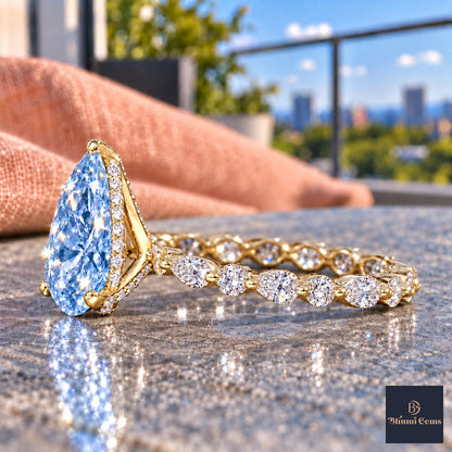 Blue Pear Cut Lab Grown Diamond Engagement Ring - Navette Band in yellow gold, side view