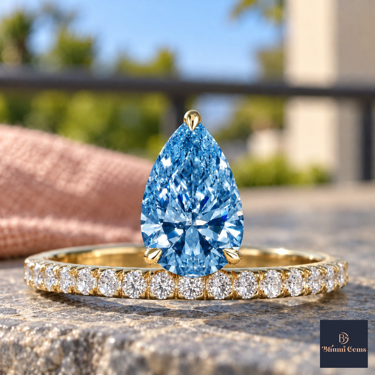 Blue Pear Cut Lab Grown Diamond Engagement Ring - Pave Band in yellow gold, close-up