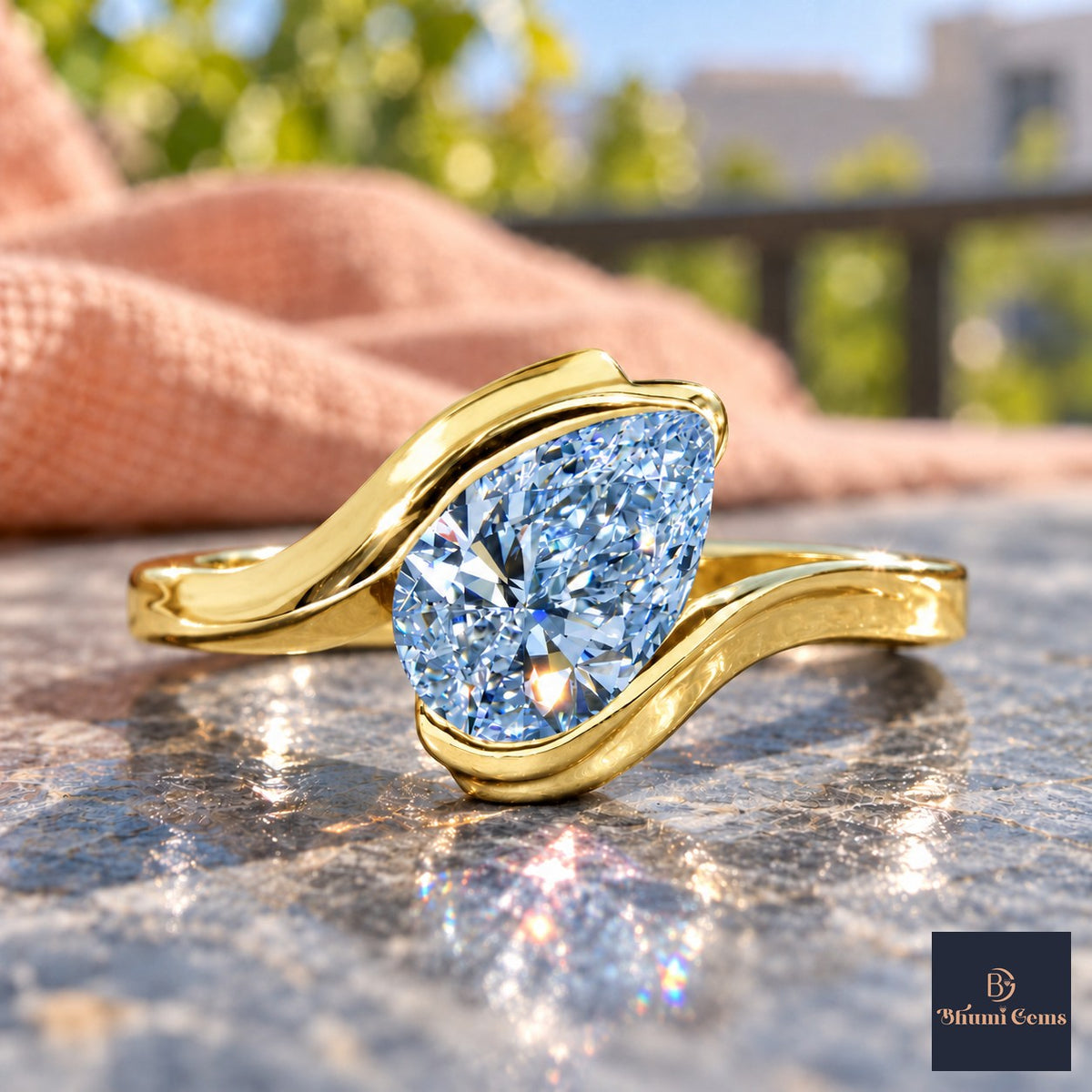 Blue Pear Cut Lab Grown Diamond Engagement Ring - Wrap Bypass Solitaire in yellow gold, close-up