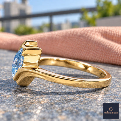 Blue Pear Cut Lab Grown Diamond Engagement Ring - Wrap Bypass Solitaire in yellow gold, side view