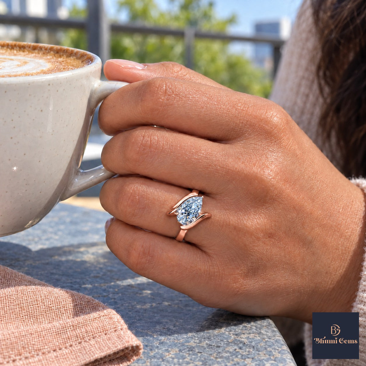 Blue Pear Cut Lab Grown Diamond Engagement Ring - Wrap Bypass Solitaire in rose gold, on the hand