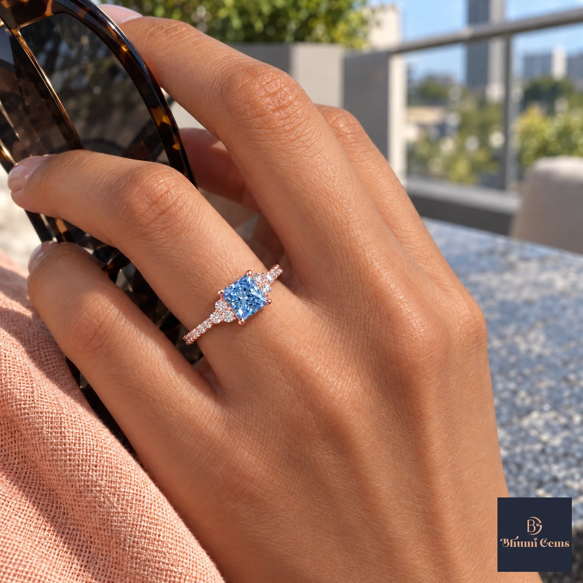 Blue Princess Cut Lab Grown Diamond Engagement Ring - Cluster Pave Band in rose gold, worn on the hand