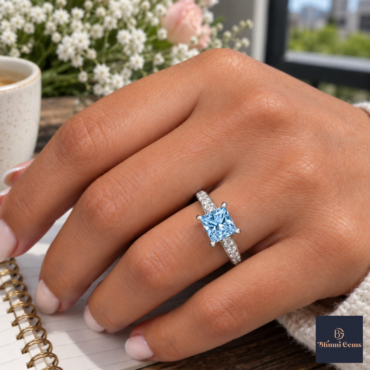 Blue Princess Cut Lab Grown Diamond Engagement Ring - Pave Band in white gold, worn on the hand