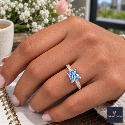 Blue Princess Cut Lab Grown Diamond Engagement Ring - Pave Band in rose gold, worn on the hand