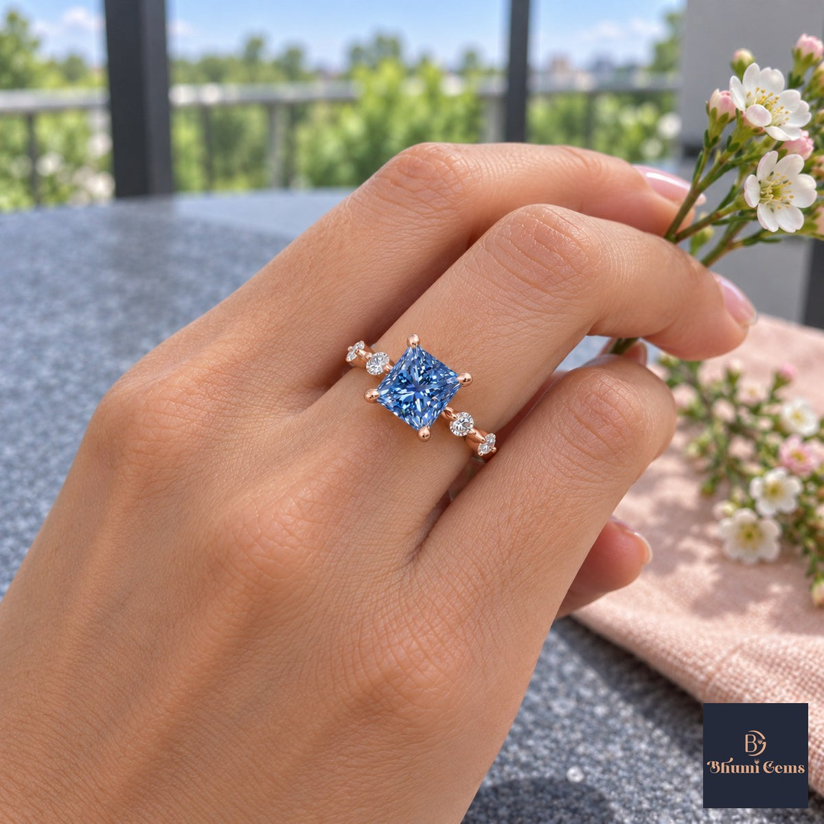Blue Princess Cut Lab Grown Diamond Engagement Ring - Station Band in rose gold, on the hand