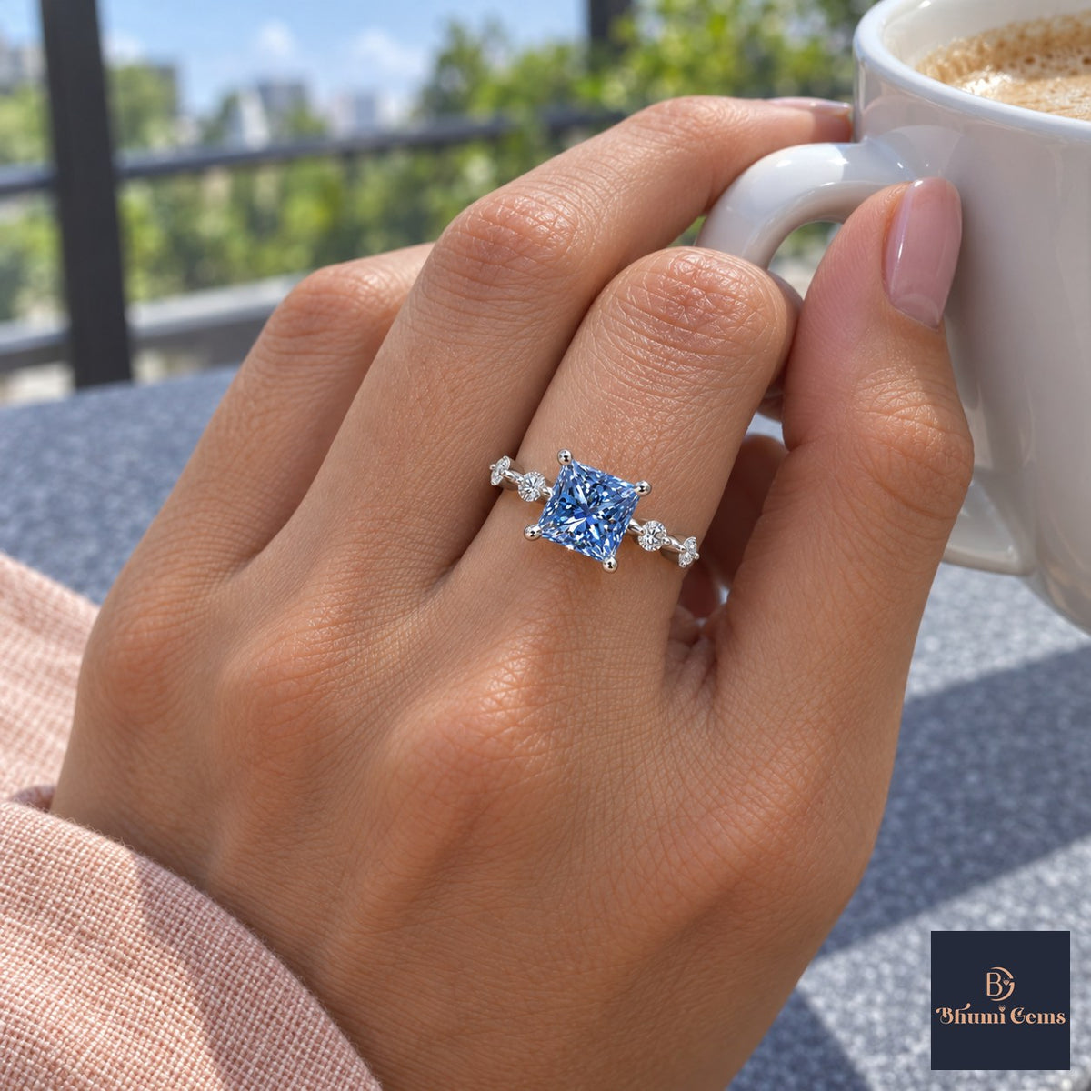 Blue Princess Cut Lab Grown Diamond Engagement Ring - Station Band in white gold, worn on the hand
