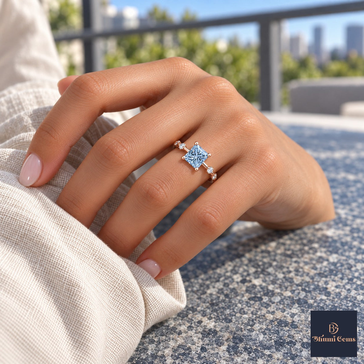 Blue Princess Cut Lab Grown Diamond Engagement Ring - Station Band in rose gold, worn on the hand