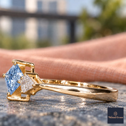 Blue Princess Cut Lab Grown Diamond Engagement Ring - Trillion Three Stone in yellow gold, side view