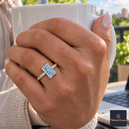 Blue Radiant Cut Lab Grown Diamond Engagement Ring - Cathedral Pave Band in yellow gold, on the hand