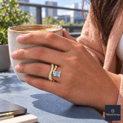 Blue Radiant Cut Lab Grown Diamond Engagement Ring - Pave Wrap Bypass in yellow gold, on the hand