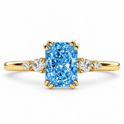 Blue Radiant Cut Lab Grown Diamond Engagement Ring - Round Accents in yellow gold, front view