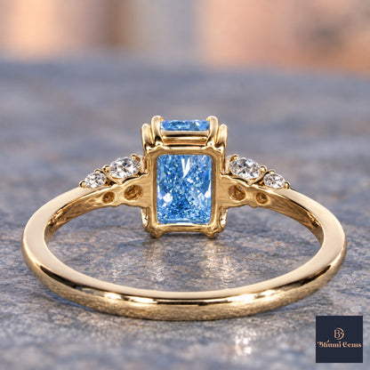 Blue Radiant Cut Lab Grown Diamond Engagement Ring - Round Accents in yellow gold, gallery view