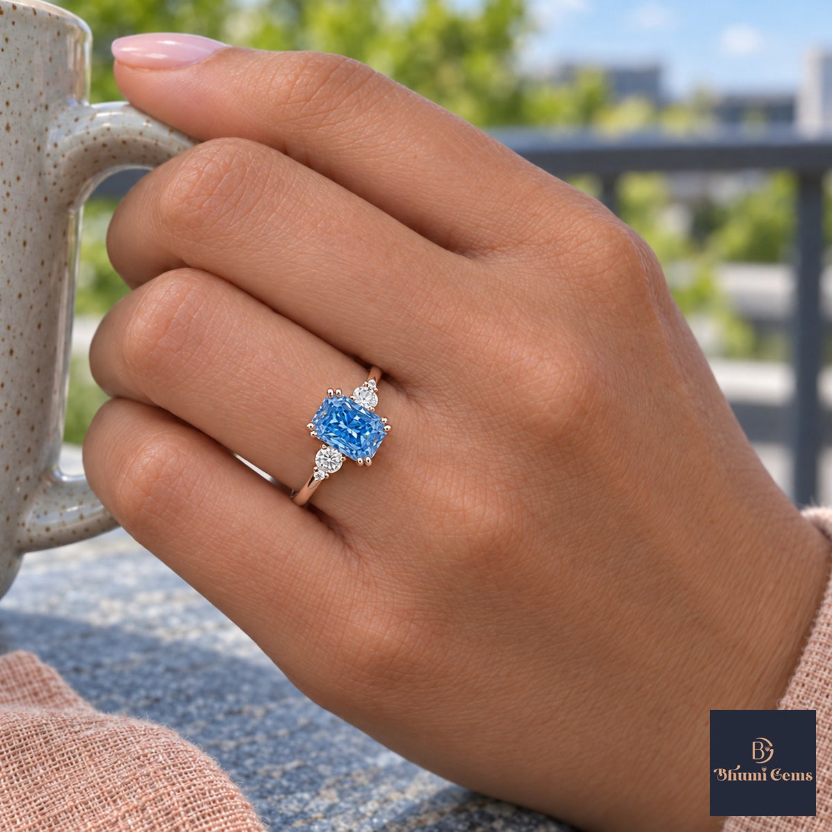 Blue Radiant Cut Lab Grown Diamond Engagement Ring - Round Accents in rose gold, on the hand
