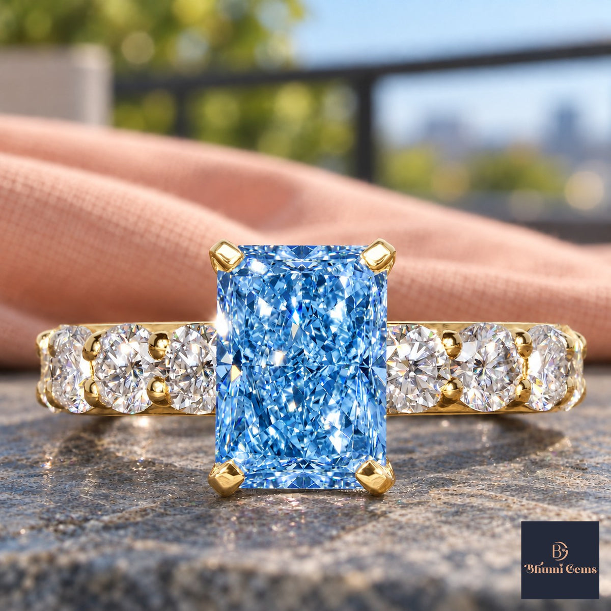 Blue Radiant Cut Lab Grown Diamond Engagement Ring - Shared Prong Band in yellow gold, close-up