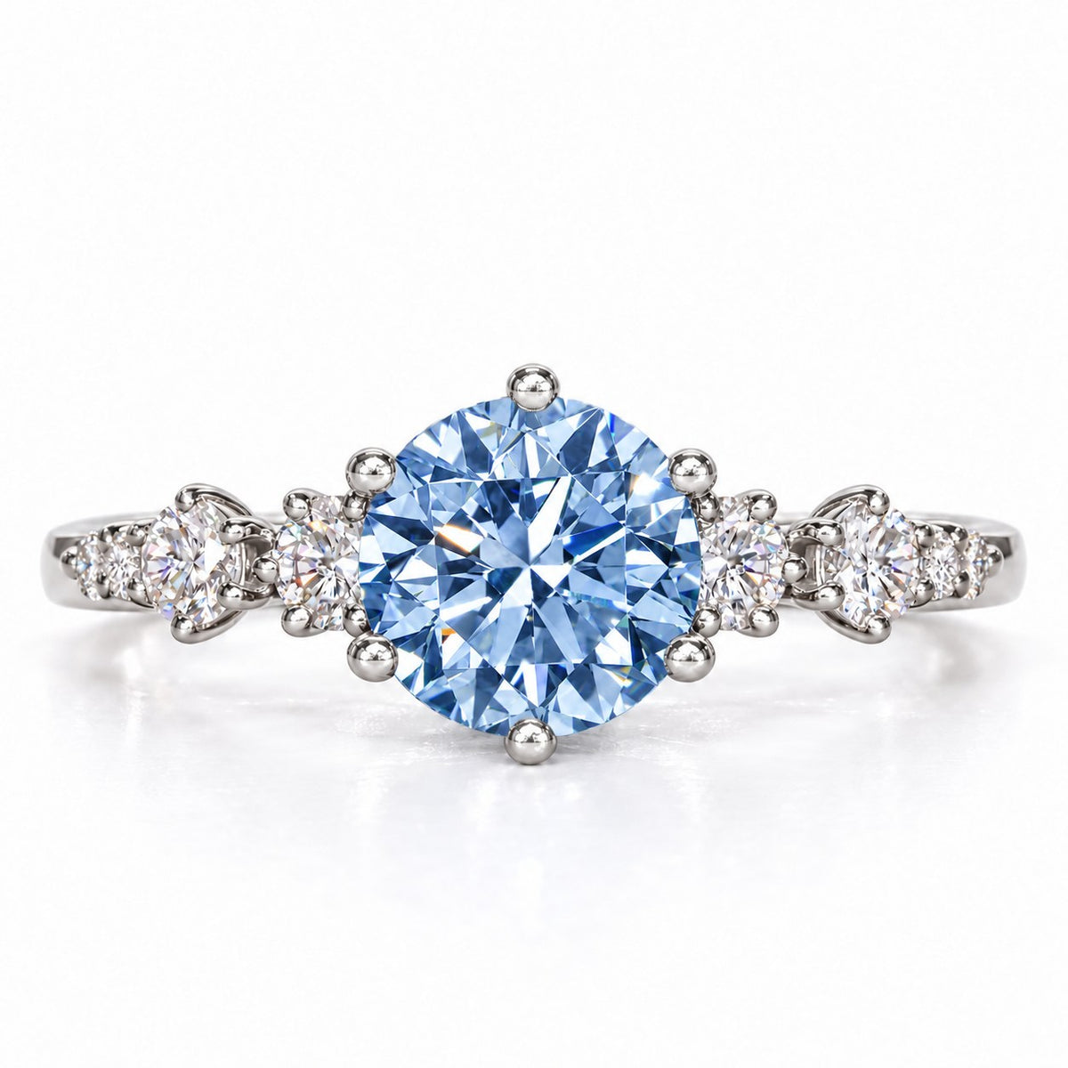 Blue Round Cut Lab Grown Diamond Engagement Ring - Cluster Shoulders in white gold, front view