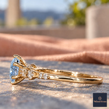Blue Round Cut Lab Grown Diamond Engagement Ring - Cluster Shoulders in yellow gold, side view