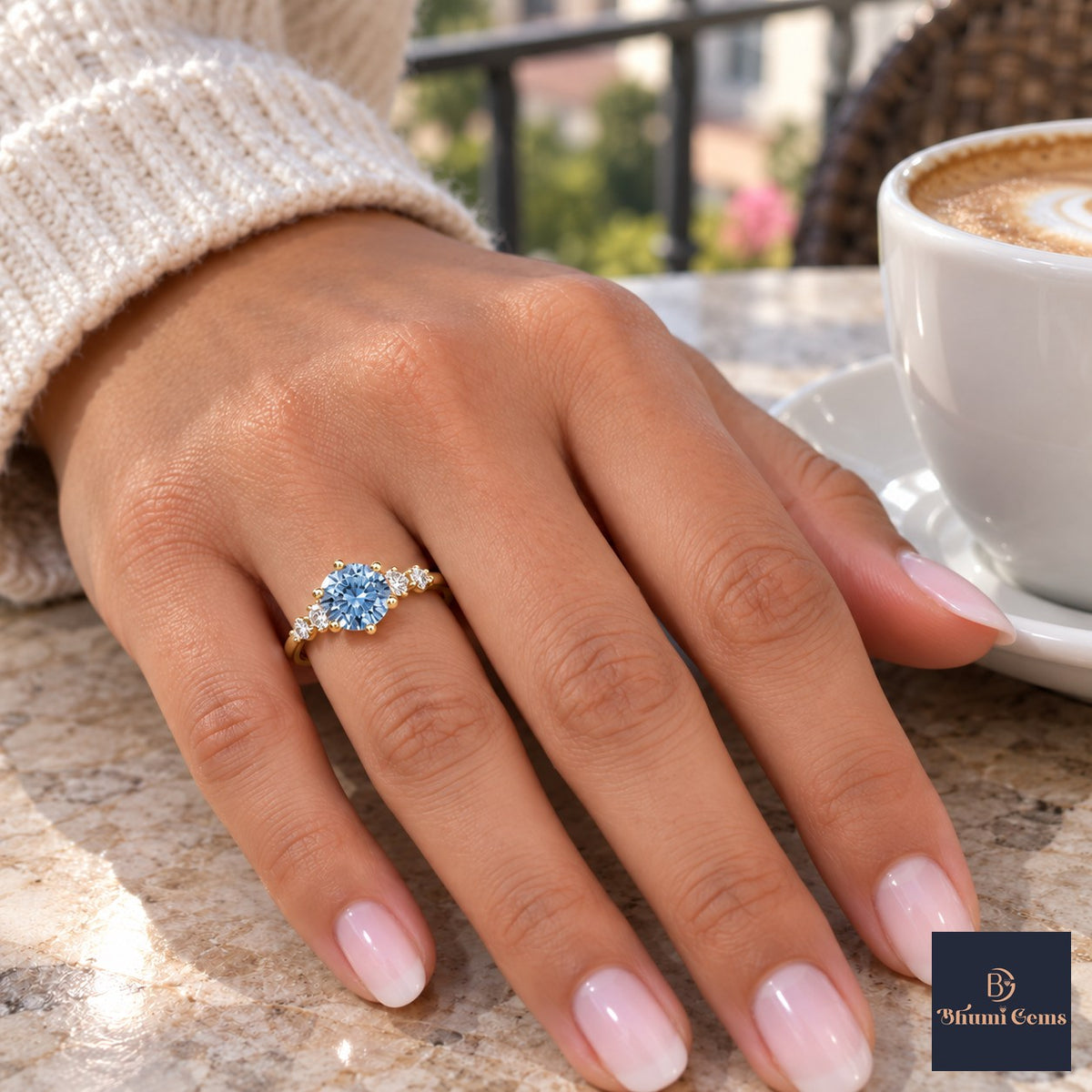 Blue Round Cut Lab Grown Diamond Engagement Ring - Cluster Shoulders in yellow gold, on the hand