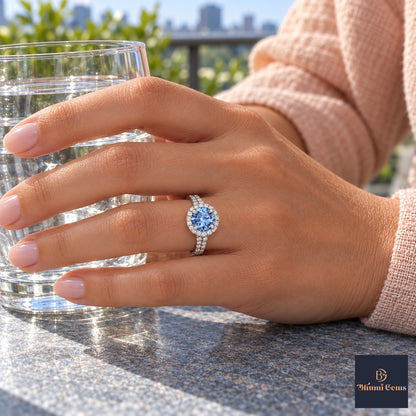 Blue Round Cut Lab Grown Diamond Engagement Ring - Halo Pave in white gold, on the hand
