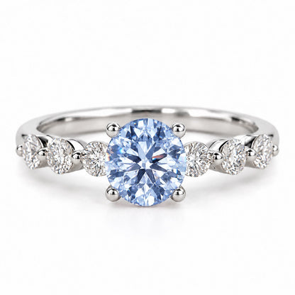 Blue Round Cut Lab Grown Diamond Engagement Ring - Marquise and Round Station Band in white gold, front view