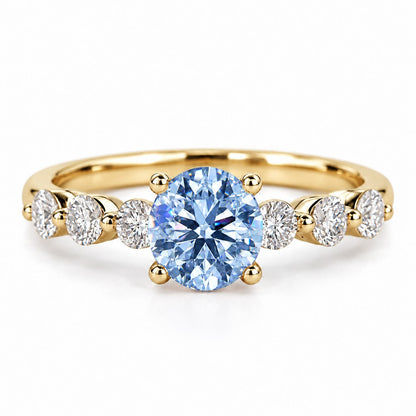 Blue Round Cut Lab Grown Diamond Engagement Ring - Marquise and Round Station Band in yellow gold, front view
